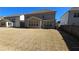 Large backyard with a patio area, perfect for outdoor entertaining and relaxation at 112 Austin Dr, Sandy Springs, GA 30328