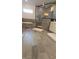 Elegant bathroom showcasing a glass shower, tiled floor, and a soaking tub at 112 Austin Dr, Sandy Springs, GA 30328