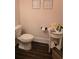 Cozy powder room featuring charming decor, with stylish accents creates a welcoming and functional space at 112 Austin Dr, Sandy Springs, GA 30328