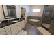 Spacious bathroom with a soaking tub, glass shower, and vanity with drawers and cabinet space at 112 Austin Dr, Sandy Springs, GA 30328