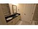 Bathroom with double sinks and framed mirrors at 112 Austin Dr, Sandy Springs, GA 30328