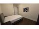 Bedroom with hardwood floors, neutral walls, and a black and white photo hanging on the wall at 112 Austin Dr, Sandy Springs, GA 30328