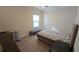 Cozy bedroom featuring neutral walls, carpeted floor, and a comfortable single bed at 112 Austin Dr, Sandy Springs, GA 30328