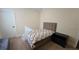 Bedroom with carpet, neutral walls and trim, and a modern bed frame with padded headboard at 112 Austin Dr, Sandy Springs, GA 30328