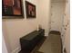 Entryway featuring modern bench, artwork and neutral colors at 112 Austin Dr, Sandy Springs, GA 30328