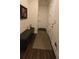 Entryway featuring modern bench, artwork and neutral colors at 112 Austin Dr, Sandy Springs, GA 30328