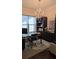 A stylish home office featuring built-in shelves, a modern desk, an ergonomic chair and lots of natural light at 112 Austin Dr, Sandy Springs, GA 30328