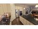 Open kitchen with island, stainless steel appliances, and easy access to dining and living areas at 112 Austin Dr, Sandy Springs, GA 30328