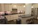 Bright kitchen featuring an island, stainless steel appliances and plenty of counter space at 112 Austin Dr, Sandy Springs, GA 30328
