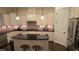 Spacious kitchen with granite island, stainless steel appliances, and light-colored cabinetry at 112 Austin Dr, Sandy Springs, GA 30328
