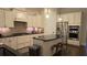 Contemporary kitchen with stainless steel appliances, a center island, and ample cabinet storage at 112 Austin Dr, Sandy Springs, GA 30328