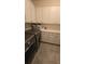 Well-equipped laundry room with modern washer and dryer, ample cabinetry, and a clean, functional design at 112 Austin Dr, Sandy Springs, GA 30328