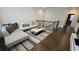 Inviting living room featuring stylish furnishings, a cozy sectional sofa, and a sleek coffee table at 112 Austin Dr, Sandy Springs, GA 30328
