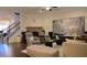 Spacious living room with fireplace, staircase, and elegant furnishings at 112 Austin Dr, Sandy Springs, GA 30328