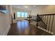 Upstairs living area features a large window, comfortable couch and decorative rug, great for entertaining or relaxing at 112 Austin Dr, Sandy Springs, GA 30328