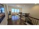 Upstairs living area features a large window, comfortable couch and decorative rug, great for entertaining or relaxing at 112 Austin Dr, Sandy Springs, GA 30328