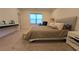 Comfortable main bedroom with a bed, side tables, and a seating area, all bathed in soft natural light at 112 Austin Dr, Sandy Springs, GA 30328