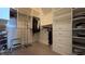 Well-organized walk-in closet with clothing racks, shelving, and drawers for ample storage space at 112 Austin Dr, Sandy Springs, GA 30328