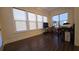 Bright workout area with several windows, exercise equipment and wood flooring at 112 Austin Dr, Sandy Springs, GA 30328