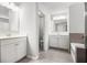 Bathroom featuring double sinks, a tiled floor, and updated lighting at 119 Fountain Oak, Villa Rica, GA 30180