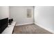 Bedroom with new carpet, fresh paint, and a window at 119 Fountain Oak, Villa Rica, GA 30180