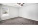 Bedroom with new carpet, fresh paint, ceiling fan, and a window at 119 Fountain Oak, Villa Rica, GA 30180