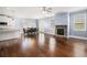 Expansive living space with hardwood flooring, stone fireplace, and an open-concept design at 119 Fountain Oak, Villa Rica, GA 30180