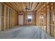 Unfinished basement with exposed ceiling beams, electrical wiring, and a concrete floor at 1632 Caswell Pkwy # 8, Marietta, GA 30060