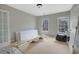 Bedroom featuring two windows and several doors at 1632 Caswell Pkwy # 8, Marietta, GA 30060