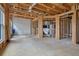 Open-concept living room under construction with exposed framing, ductwork, and space for a future kitchen at 1632 Caswell Pkwy # 8, Marietta, GA 30060