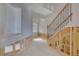 Unfinished staircase with wooden steps and wrought iron railing in a home under construction at 1632 Caswell Pkwy # 8, Marietta, GA 30060