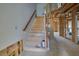 Wooden staircase under construction, showing exposed framing and unfinished walls at 1632 Caswell Pkwy # 8, Marietta, GA 30060