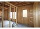 Interior framing with windows and unfinished walls showcasing a new home's structure at 2044 Ripple Park Bend, Canton, GA 30114