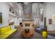 Open-concept living room showcases stone fireplace, high ceilings, and elegant decor at 2044 Ripple Park Bend, Canton, GA 30114