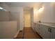 Bright bathroom featuring sleek vanity cabinets, modern fixtures, and a spacious tiled shower area at 2044 Ripple Park Bnd, Canton, GA 30114