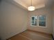 Bright bedroom showcasing neutral walls, white trim, and plenty of natural light at 2044 Ripple Park Bnd, Canton, GA 30114