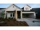 Charming single-Gathering home with a welcoming front porch and two-car garage in a suburban neighborhood at 2044 Ripple Park Bnd, Canton, GA 30114