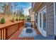 Relax on this private back deck with seating and a wooded view at 2527 Hedgeway Cir, Kennesaw, GA 30144
