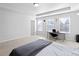 Sunlit bedroom featuring carpeted floors at 2527 Hedgeway Cir, Kennesaw, GA 30144