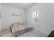 Bright bedroom with neutral walls, carpet, and a comfortable bed near the window at 2527 Hedgeway Cir, Kennesaw, GA 30144