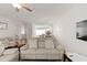 Inviting living room showcasing an open floor plan with seamless flow into the dining and kitchen areas at 2527 Hedgeway Cir, Kennesaw, GA 30144