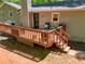 Wood deck with outdoor seating and grill at 411 Buckingham Cir, Marietta, GA 30066