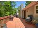 High angle view of wood deck with seating and grill at 411 Buckingham Cir, Marietta, GA 30066