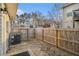 Fenced backyard area provides a private outdoor space for relaxation and recreation at 7206 Begonia Way # 4, Austell, GA 30168