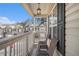 Relax on this cozy covered balcony with chairs and an open view of the community at 7206 Begonia Way # 4, Austell, GA 30168