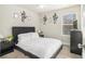 Bright bedroom offering a ceiling fan, light walls, and carpet at 7206 Begonia Way # 4, Austell, GA 30168
