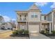 Charming townhome with a mix of brick and siding, complemented by an attached garage and a cozy balcony at 7206 Begonia Way # 4, Austell, GA 30168