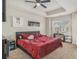 Main bedroom featuring trey ceiling, neutral paint and carpet, ceiling fan and natural light at 7206 Begonia Way # 4, Austell, GA 30168