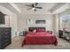Spacious main bedroom featuring a ceiling fan, neutral walls, and plush carpet at 7206 Begonia Way # 4, Austell, GA 30168