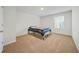 Clean bedroom with carpet flooring and large window, creating a cozy atmosphere at 13699 Inman Rd, Hampton, GA 30228